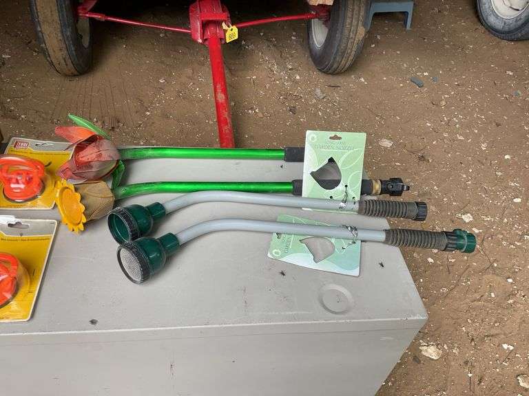 Solar garden lights and hose sprinklers