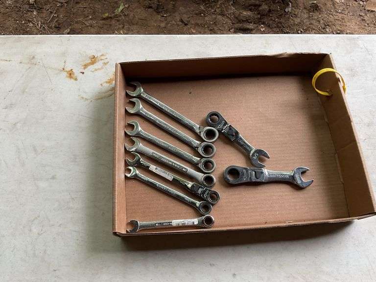 Flat of metric ratcheting combination wrenches