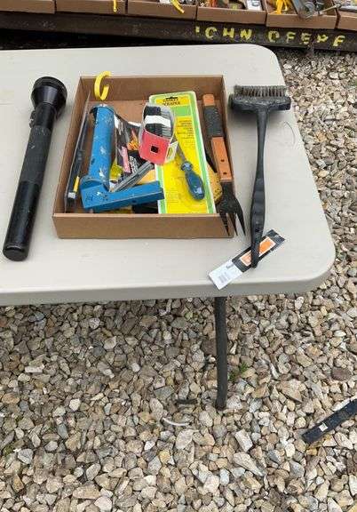 Flat with table saw push shoe, grill lighters, grill tools