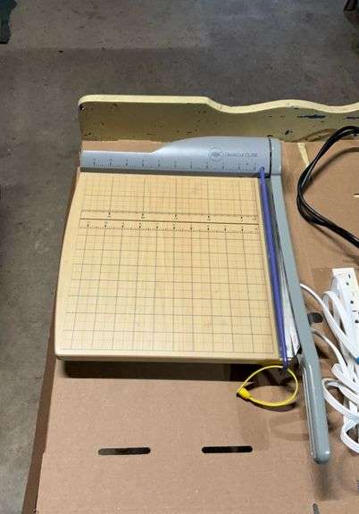 Paper cutter and power strip
