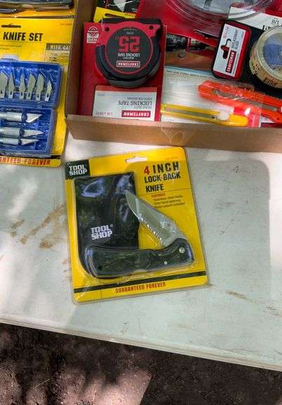 Flat of utility knives, band saw blades, tape measure replacement