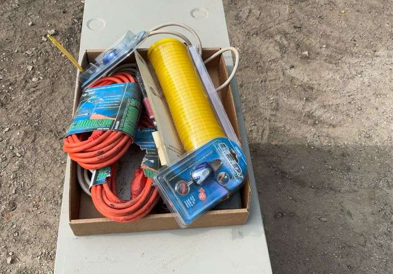 Flat of extension cords, air hose, hex keys, tape measure