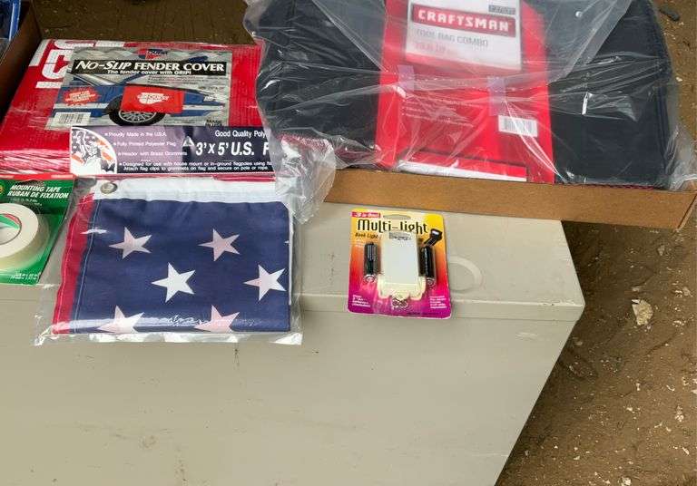 2 flats of flags, toolbox liner, tool bag, utility knives and misc.