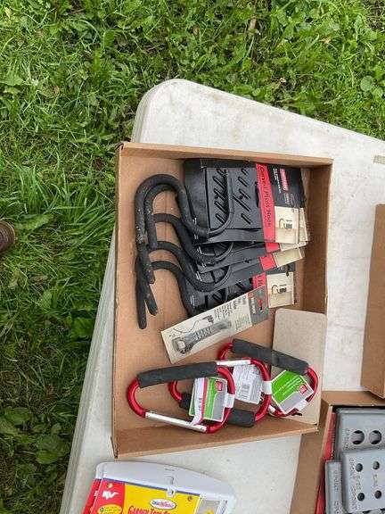 Flat of tool organizers, carabineers, storage hooks
