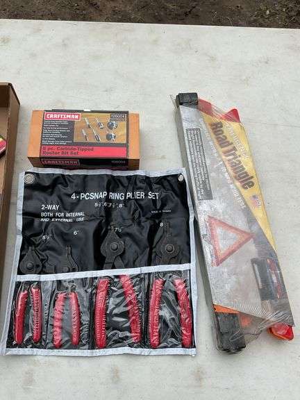 FLat of router bits, wire tool, snap ring tires, road triangles
