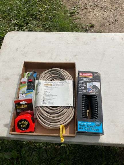 Flat of extension cord, air hose, & tape measure