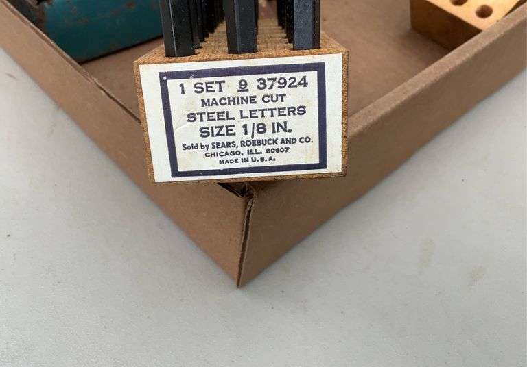Flat of steel letters, 1/8" ; hole saw bits