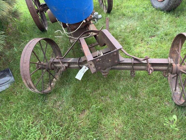 Steel wheeled cart(was once a saw rig) with Farm Master, Sears Roebuck and