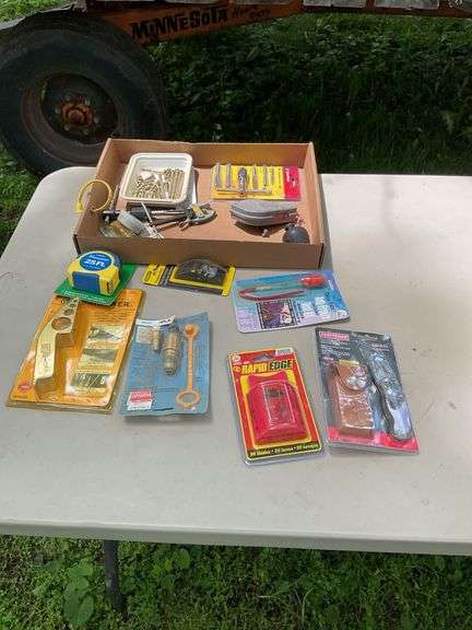 Flat of chalk line, utility knives, thread taps, misc