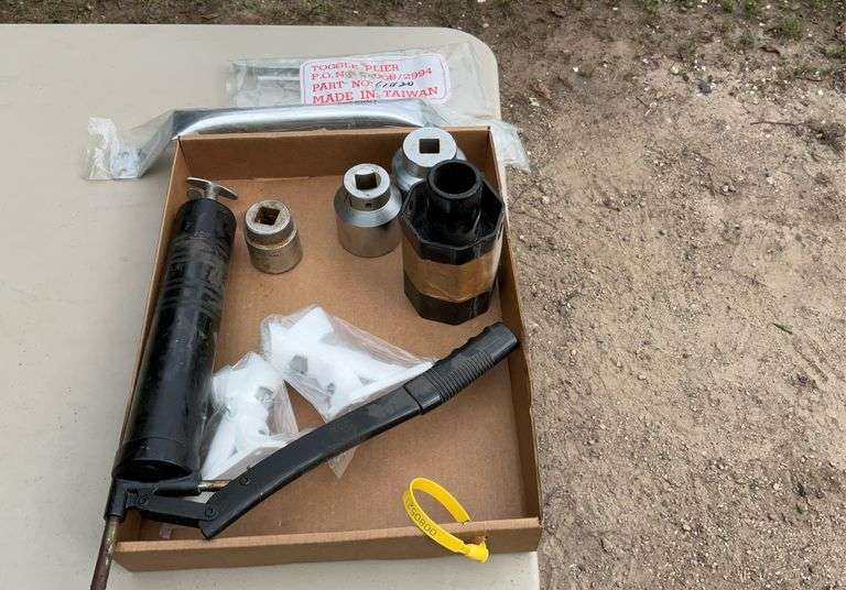 Flat of grease gun, 3/4 drive bits, flag holders