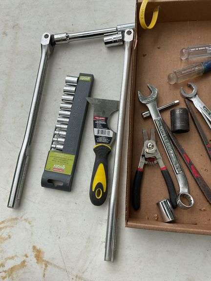 flat with evolv 10pc 1/4" drive socket set, tape measures, screw drivers, p