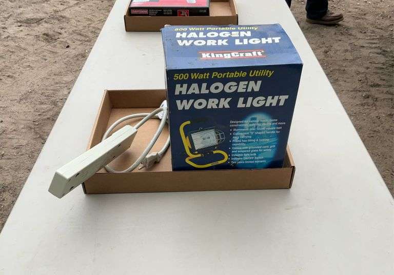 Flat of halogen work light, power strip, misc