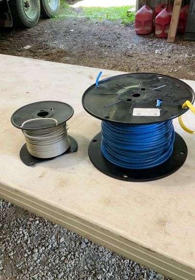 2 spools of telephone wire;