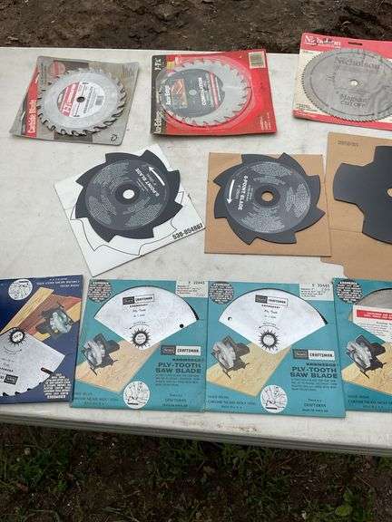 Flat of new & used saw blades