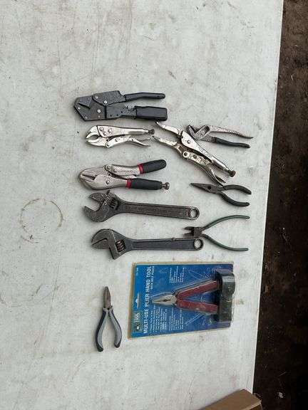 Flat of adjustable wrenches, vice grips, multi use pliers
