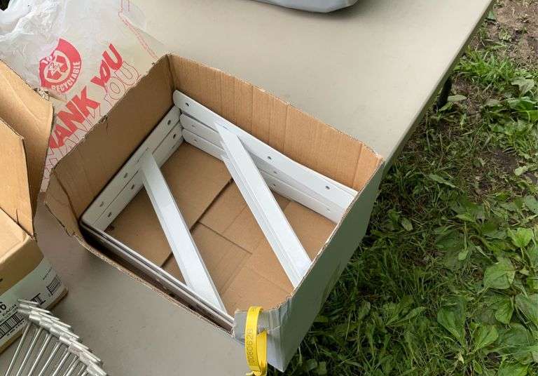 2 boxes of shelving brackets & hooks