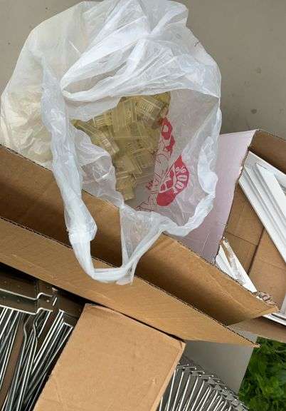 2 boxes of shelving brackets & hooks