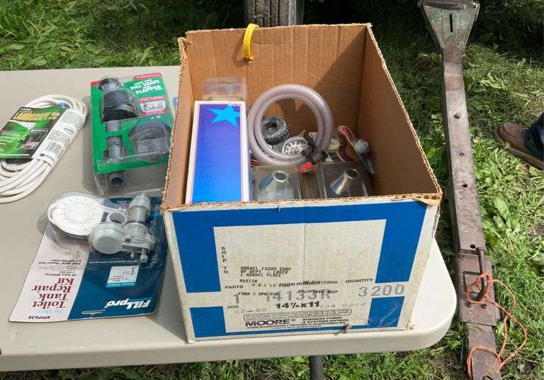 Box of plumbing supplies