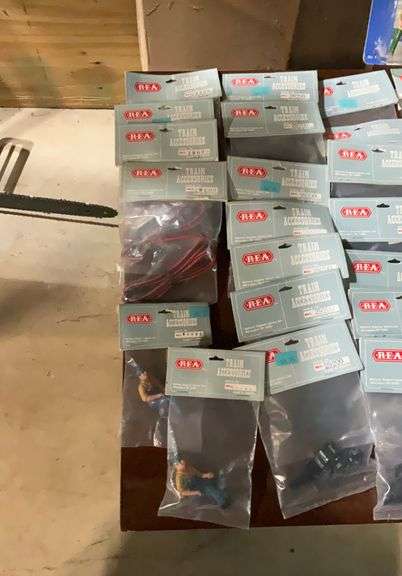 2 boxes of train related accessories