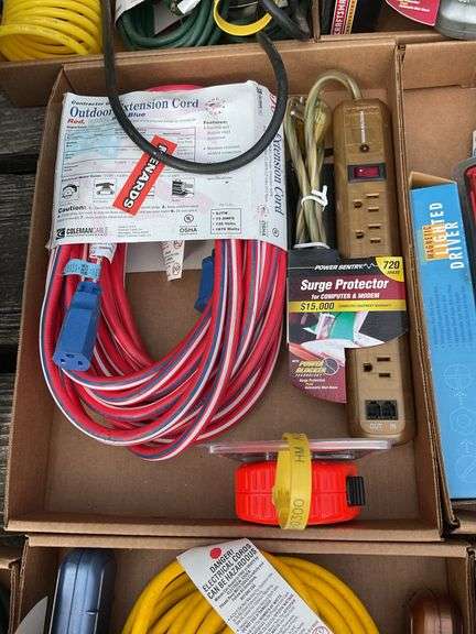 Flat of extension cords, power strips, tape measure