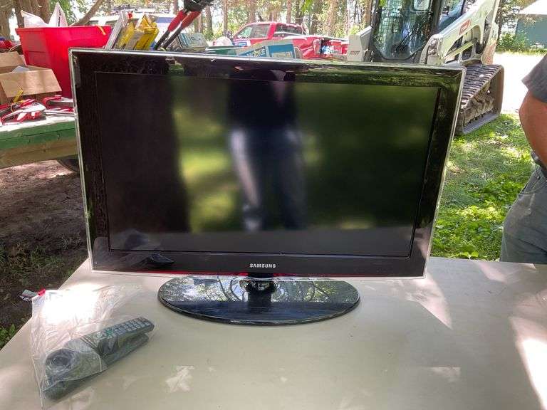 Samsung flat screen tv & small fridge