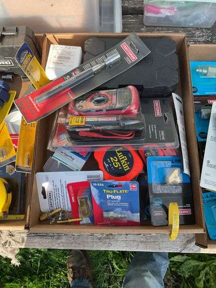 Flat with multi meter, Craftsman bit set, magnetic pick up tool, tape measu