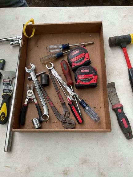 flat with evolv 10pc 1/4" drive socket set, tape measures, screw drivers, p