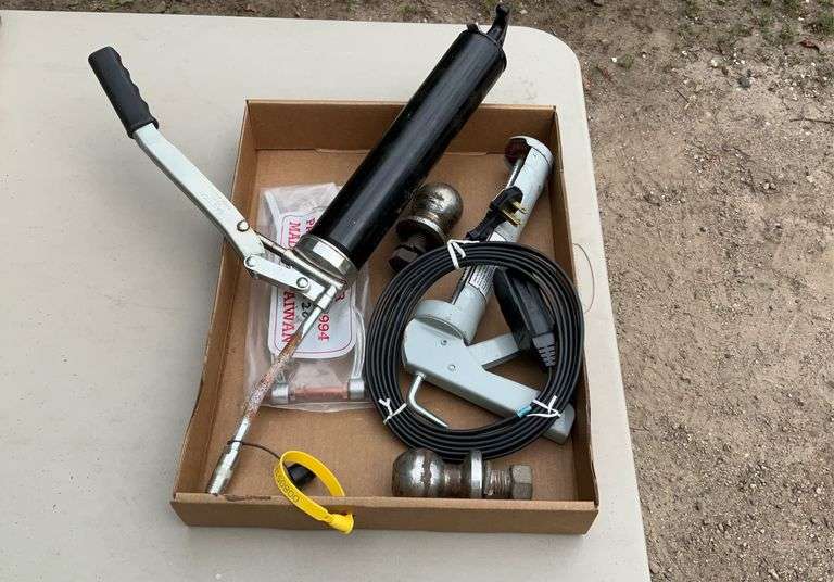 Flat of caulk gun, grease guns & toggle pliers