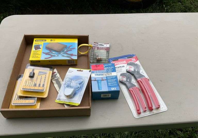 Pliers, water filter kits, drill bits
