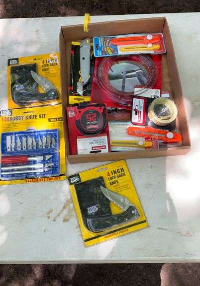 Flat of utility knives, band saw blades, tape measure replacement