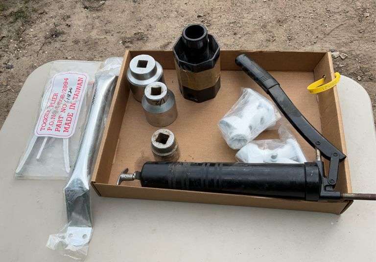 Flat of grease gun, 3/4 drive bits, flag holders