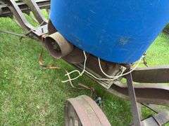 Steel wheeled cart(was once a saw rig) with Farm Master, Sears Roebuck and