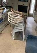 (5) stackable plastic chairs