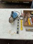 Flat with treble light, tape measure, craftsman digital torpedo level, misc