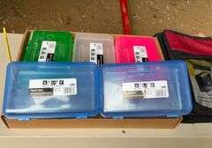 Flat of pencil boxes and three ring binder