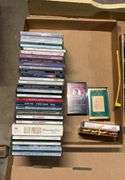 2 flats of cd's, cassettes music and VHS Tapes