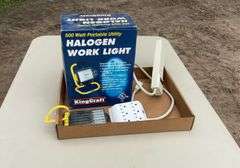 Flat of halogen work light, power strip, misc