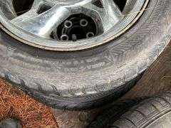 (4) 205/70r15 Tires on 5 Bolt Rims, (2) 215/55r16 Tires on 5 Bolt Rims