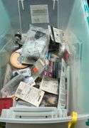 Tote of electrical supplies jig saw blades, wire staples, misc