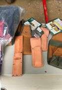 American flag, knife holder, carpenters belt, tool bag, and plier holder
