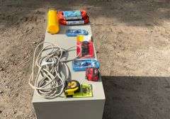 Flat of extension cords, air hose, hex keys, tape measure