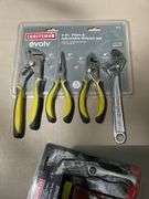 Flat of craftsman ratchets, utility knife, pliers