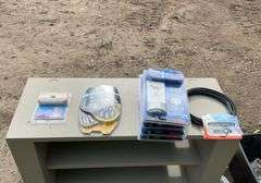 Tote of RCA connections, coaxial cable connections, surge protectors, 2-way