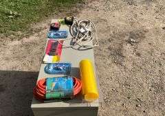 Flat of extension cords, air hose, hex keys, tape measure