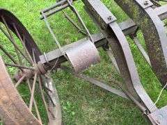 Steel wheeled cart(was once a saw rig) with Farm Master, Sears Roebuck and
