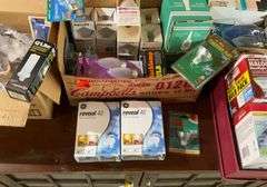 4 boxes of lights and light bulbs