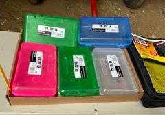Flat of pencil boxes and three ring binder