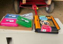 Flat of pencil boxes and three ring binder
