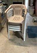 (5) stackable plastic chairs