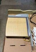 Paper cutter and power strip